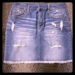 Distressed denim shirt